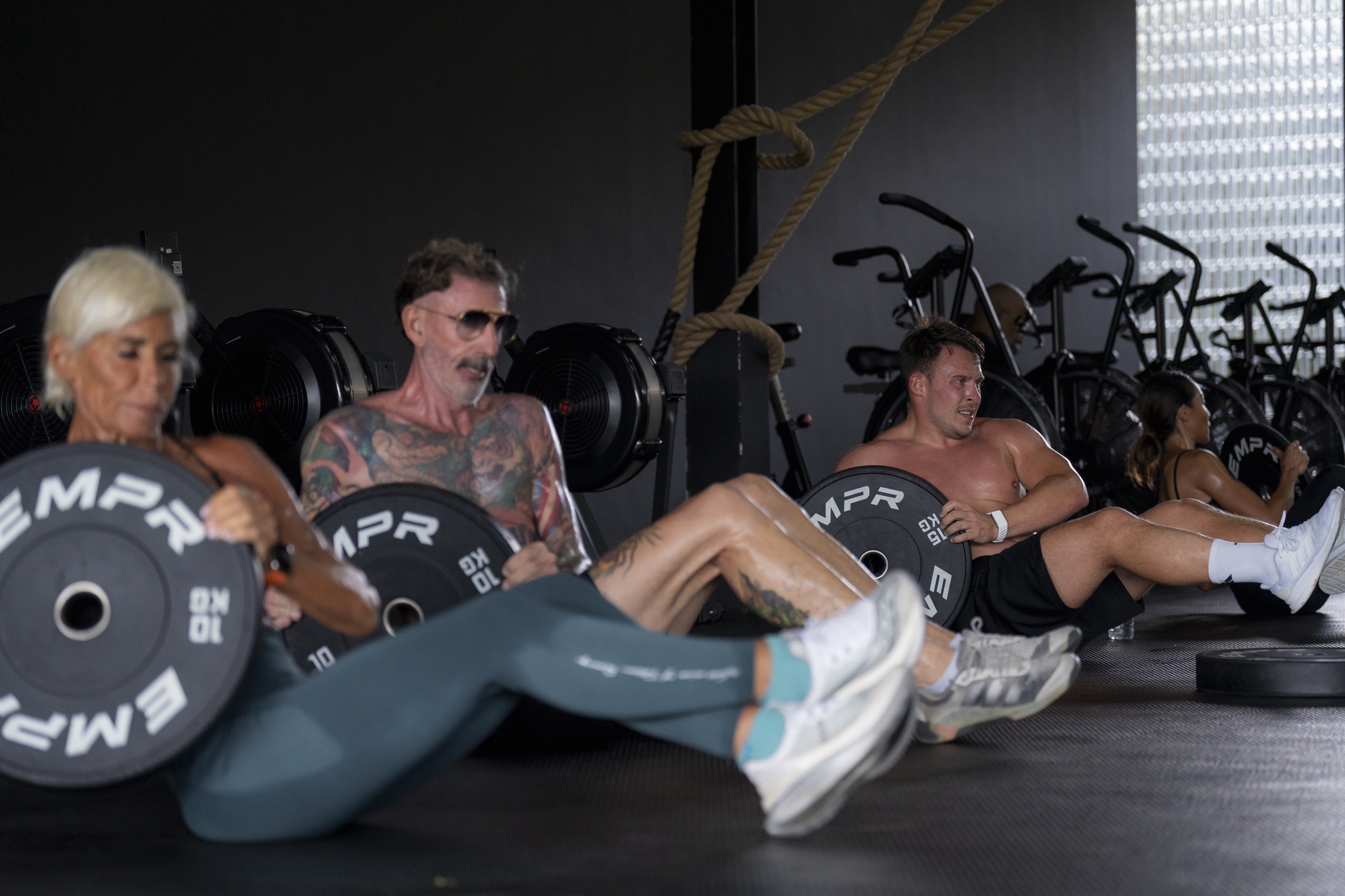 Wild Card athletes completing a core exercise