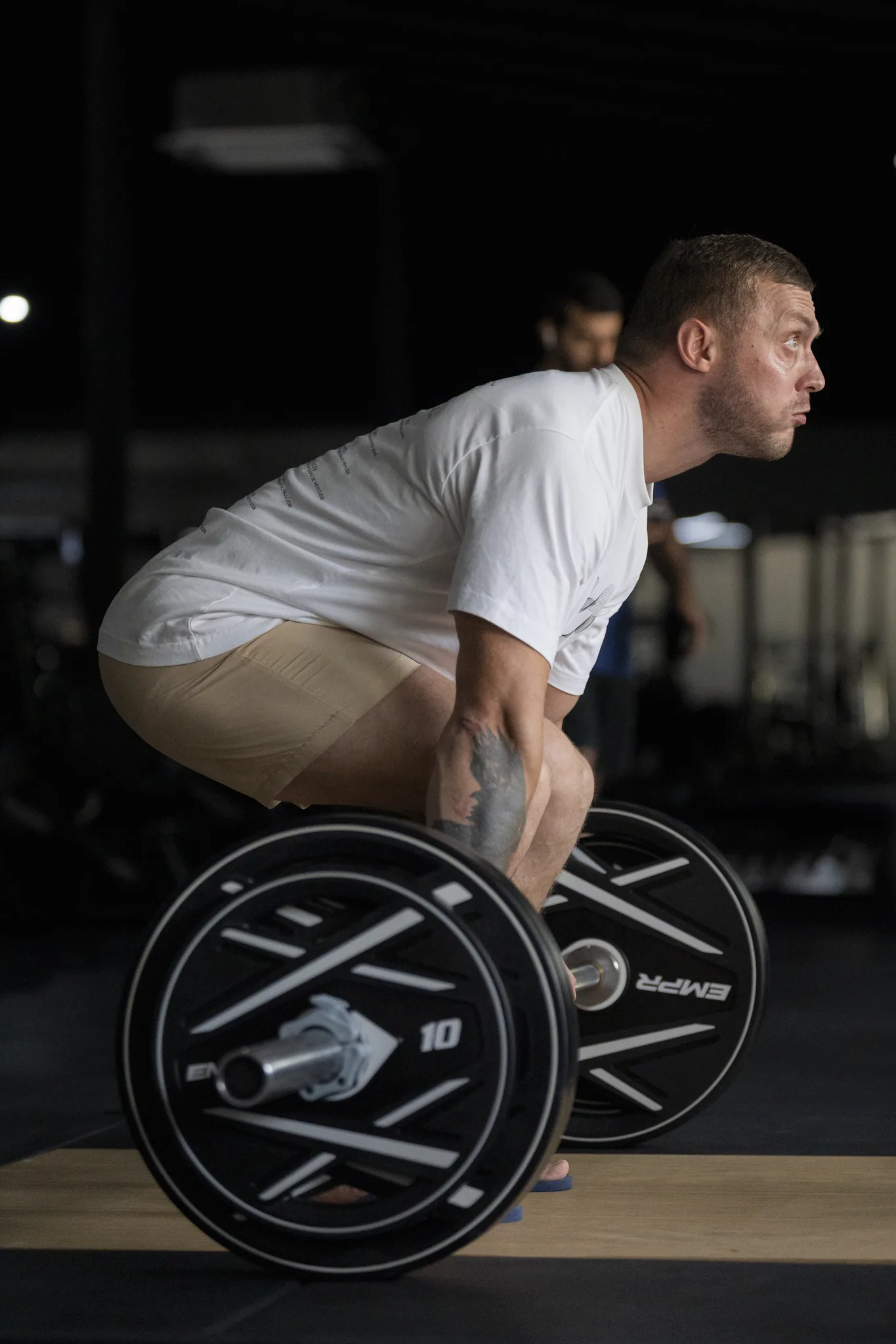 EMPOWER member deadlifting on a dedicated lifting platform