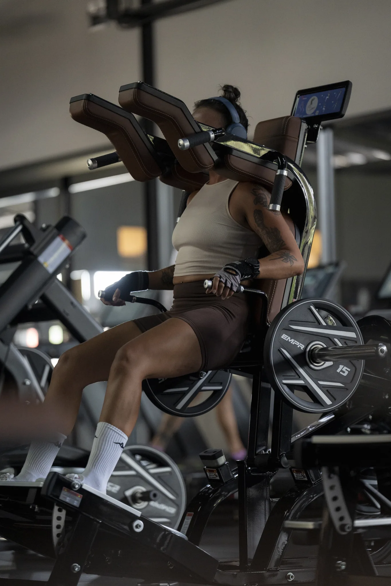 EMPOWER member training on a plate-loaded machine in the strength zone