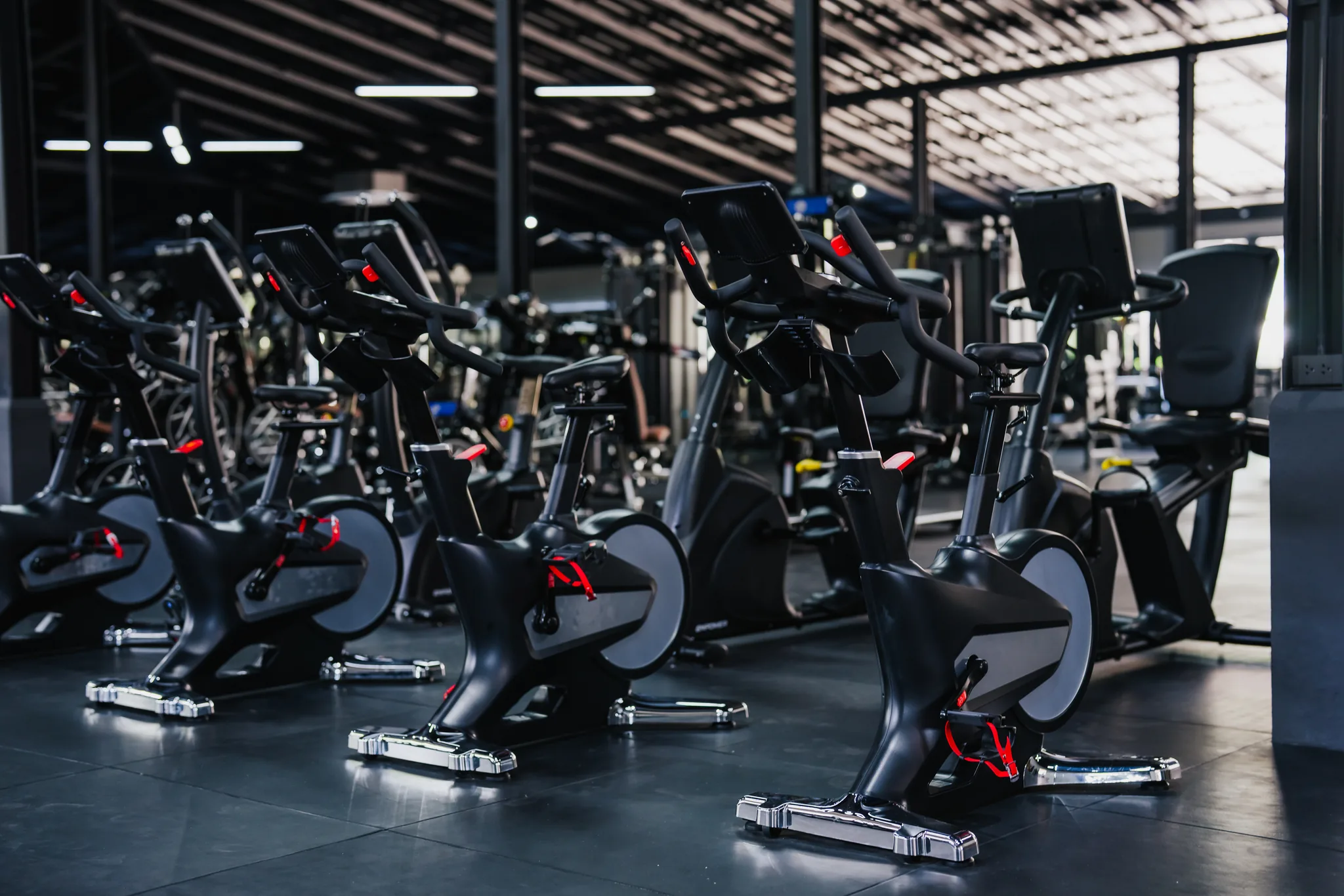 Spin bikes and cardio equipment at EMPOWER Gym Kamala