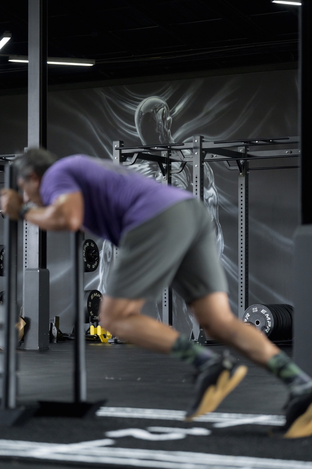 Athlete moving through a fast HYROX conditioning interval