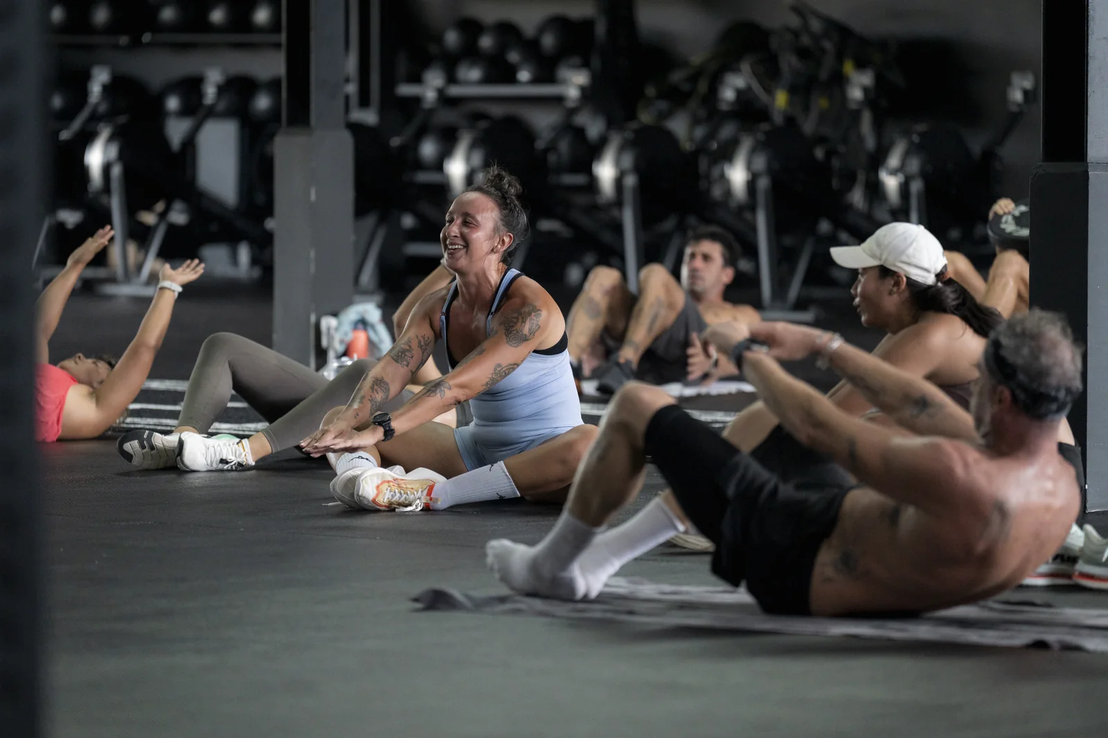 EMPOWER members smiling during floor exercises in an October class