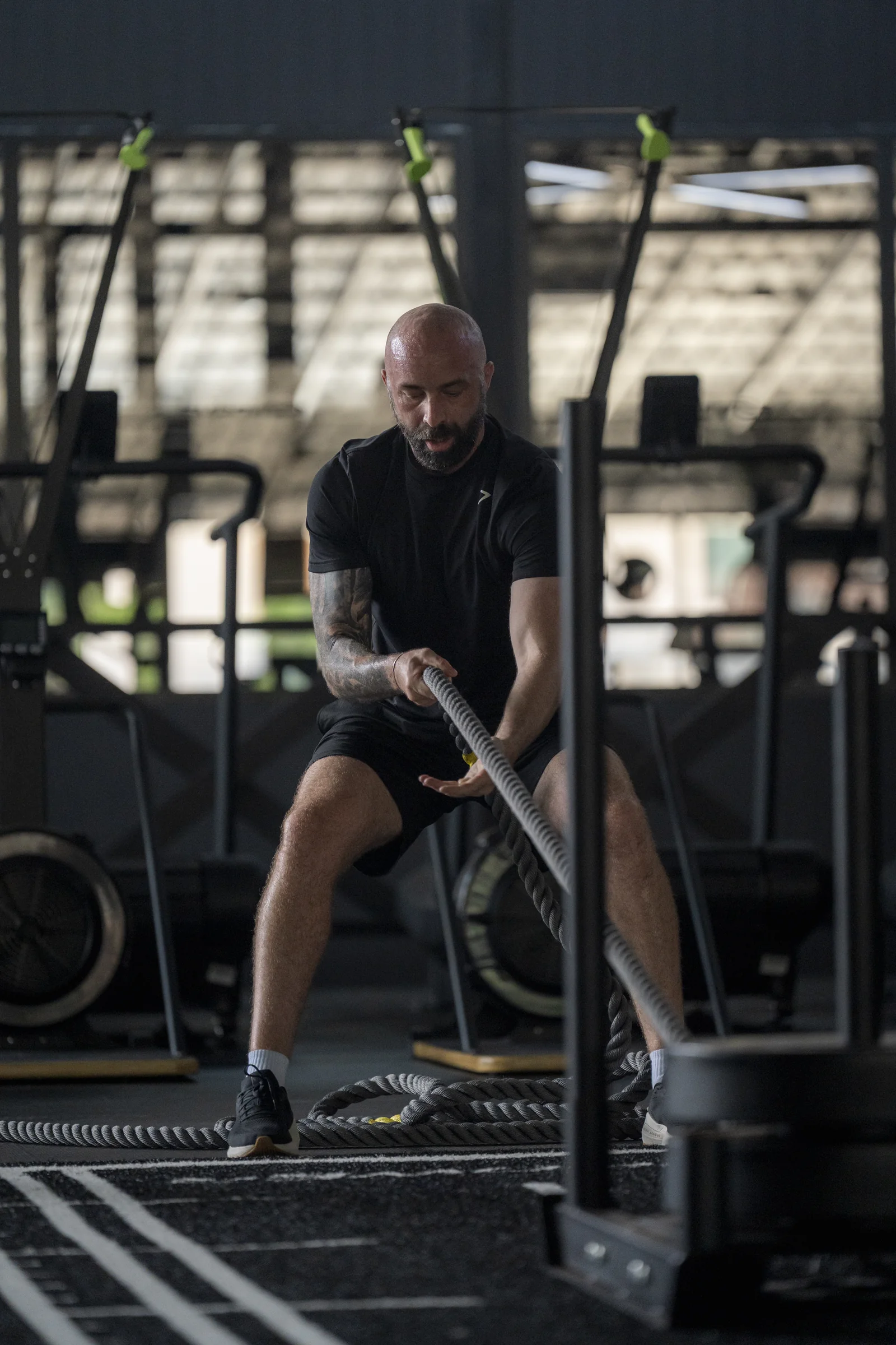 Athlete pulling a rope on the EMPOWER functional training floor