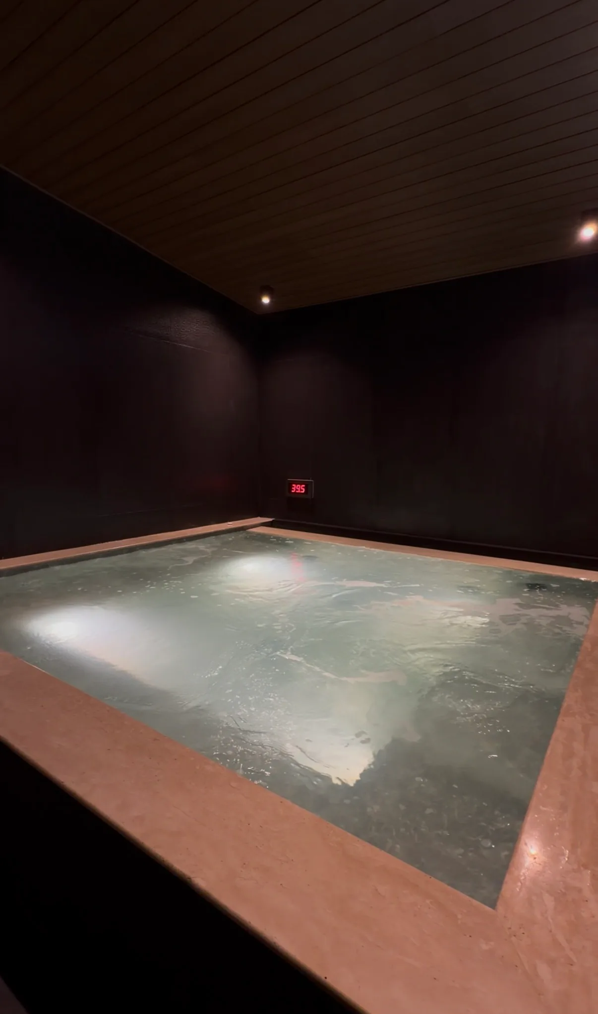 Blue-lit Japanese onsen in the EMPOWER Recovery Zone