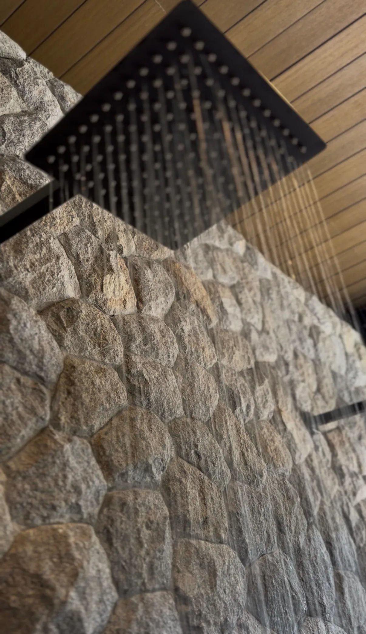 Natural stone and rain shower in the Recovery Zone