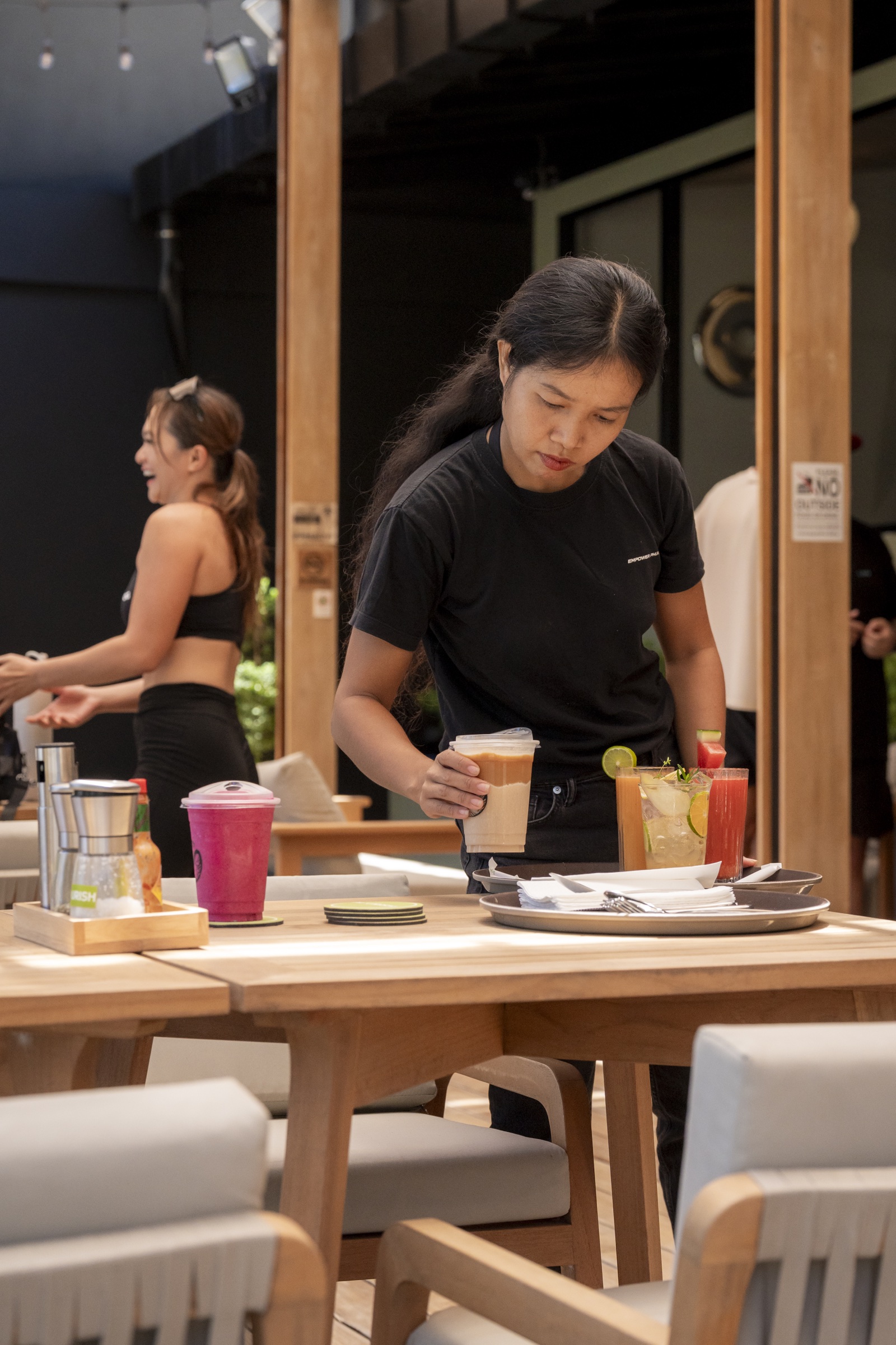 Benji serving drinks at NOURISH
