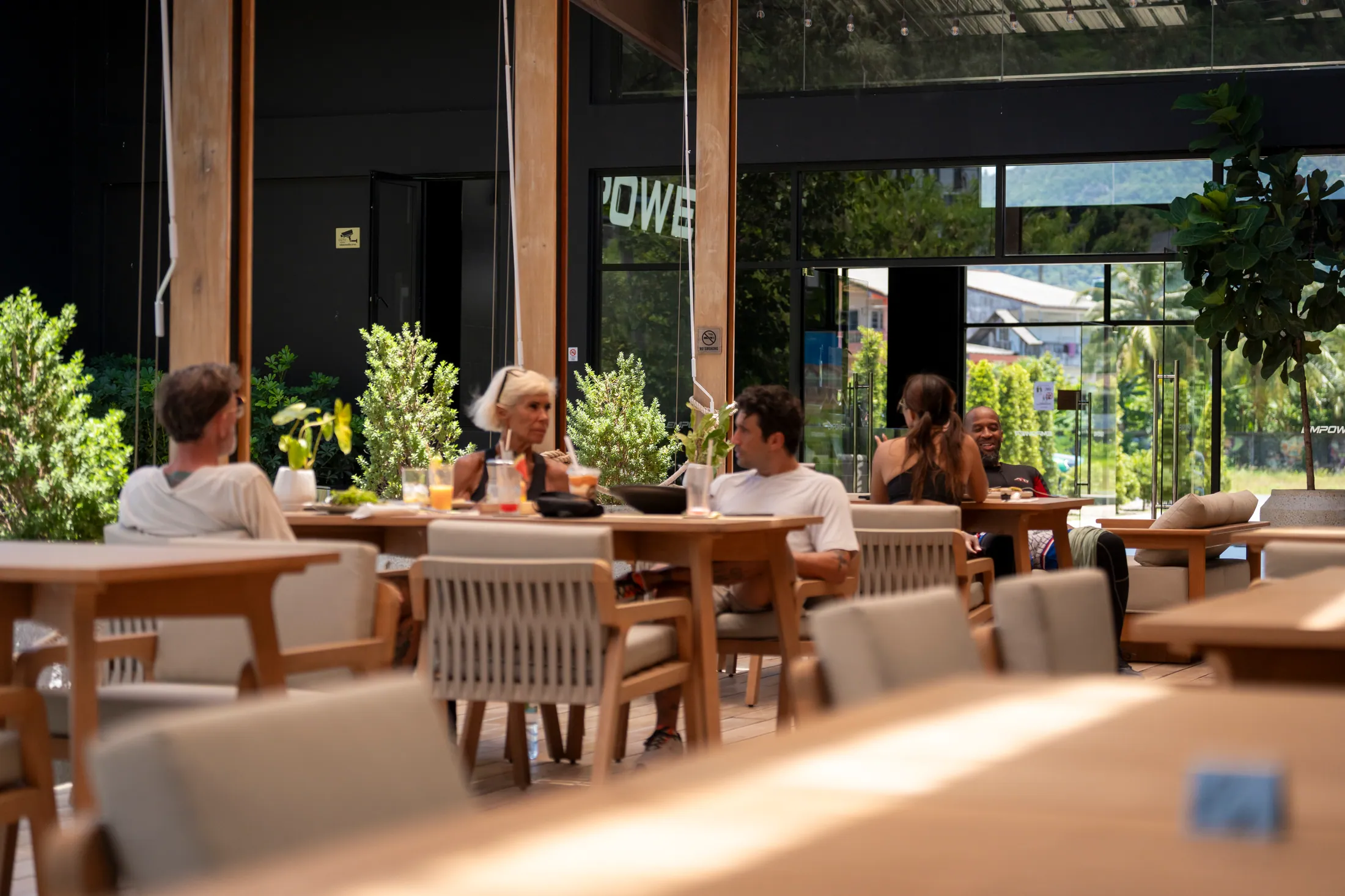 Guests enjoying the open-air NOURISH restaurant in Kamala