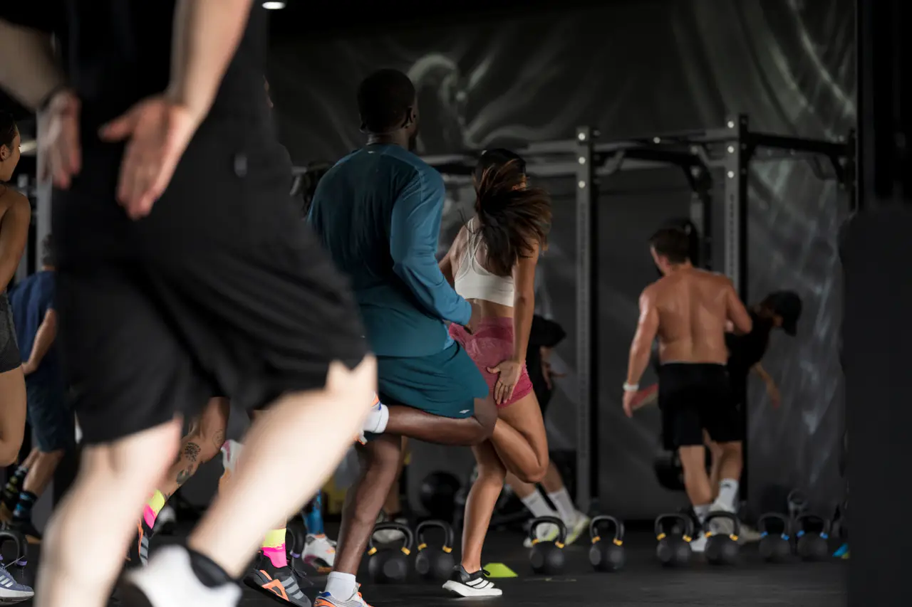 EMPOWER athletes moving together during a HIIT class