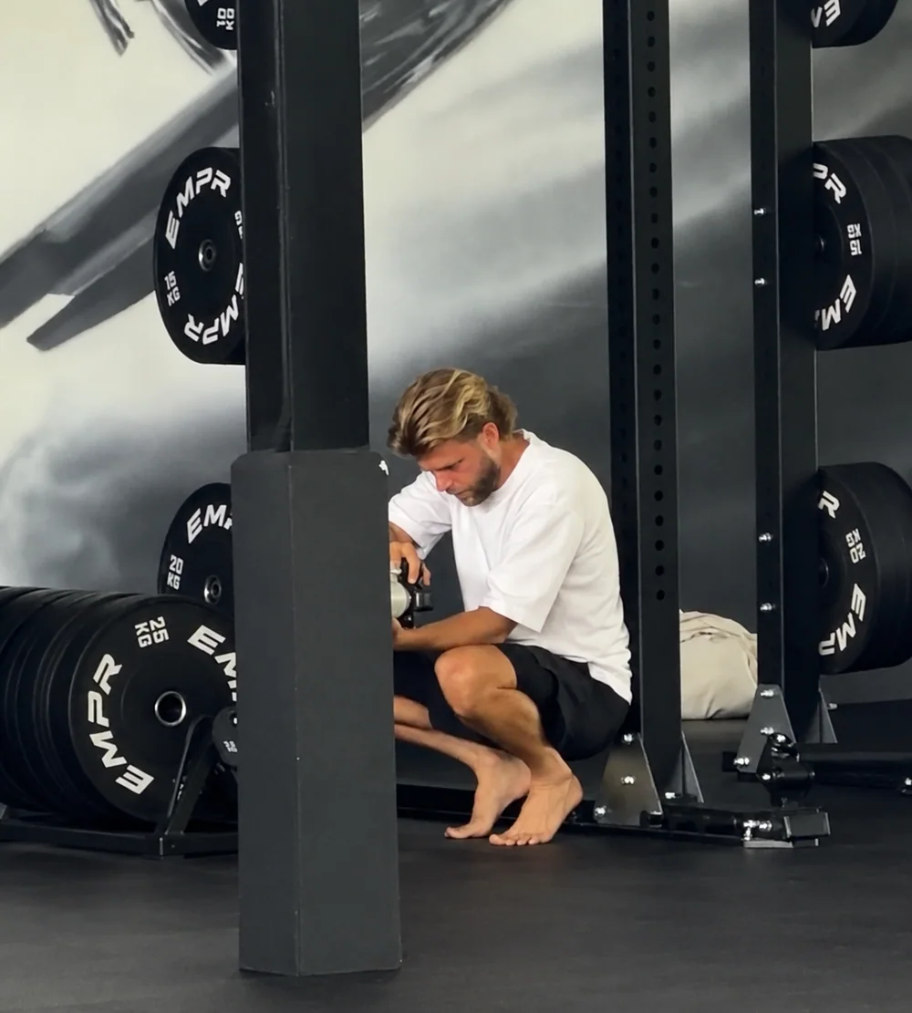Alan Mills photographing inside EMPOWER Gym